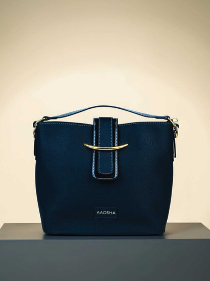 Aurora Eternal Ink vegan leather bucket bag in black with structured bucket silhouette and dual handles for women.