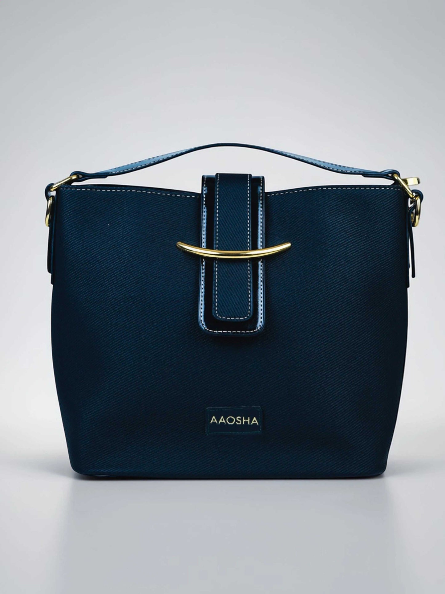 Aurora Eternal Ink vegan leather bucket bag in black with structured bucket silhouette and dual handles for women.