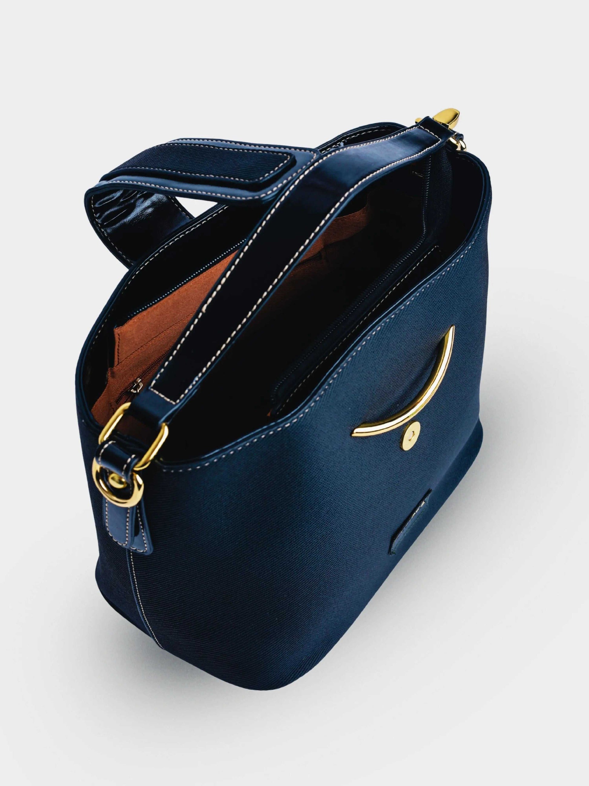 Aurora Eternal Ink vegan leather bucket bag in black with structured bucket silhouette and dual handles for women.