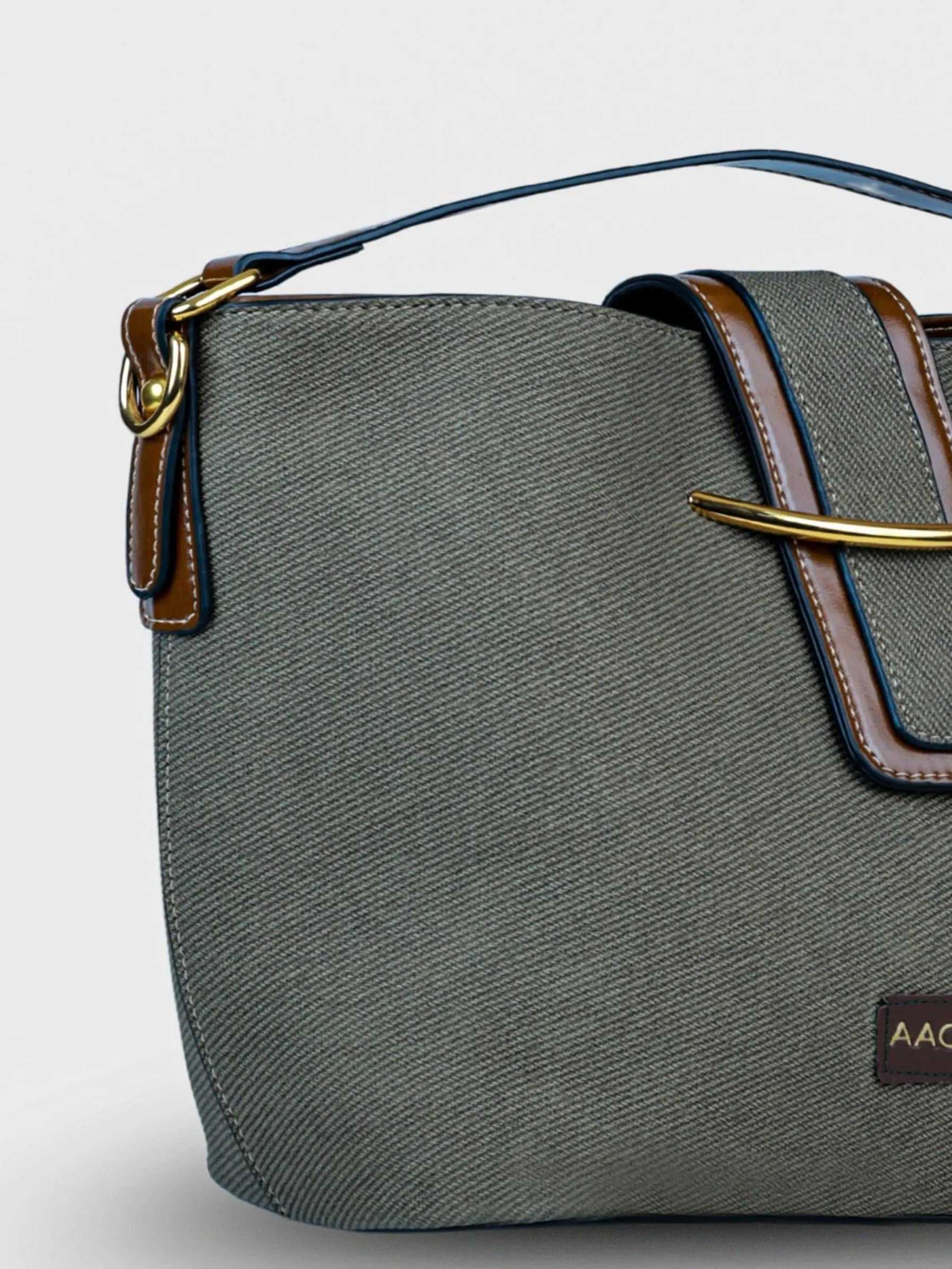 Aurora Sage Mist vegan leather bucket bag in soft sage green with structured bucket design and dual handles for women.