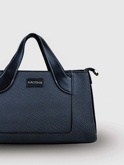Capri Eternal Ink vegan leather mini tote bag in black with structured design and dual handles for women.