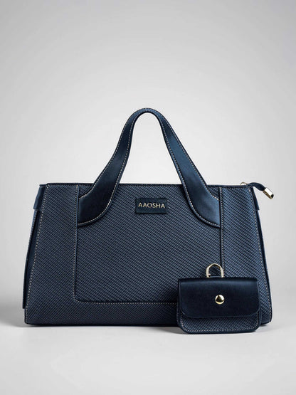 Capri Eternal Ink vegan leather mini tote bag in black with structured design and dual handles for women.