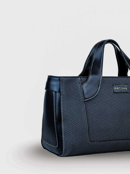 Capri Eternal Ink vegan leather mini tote bag in black with structured design and dual handles for women.