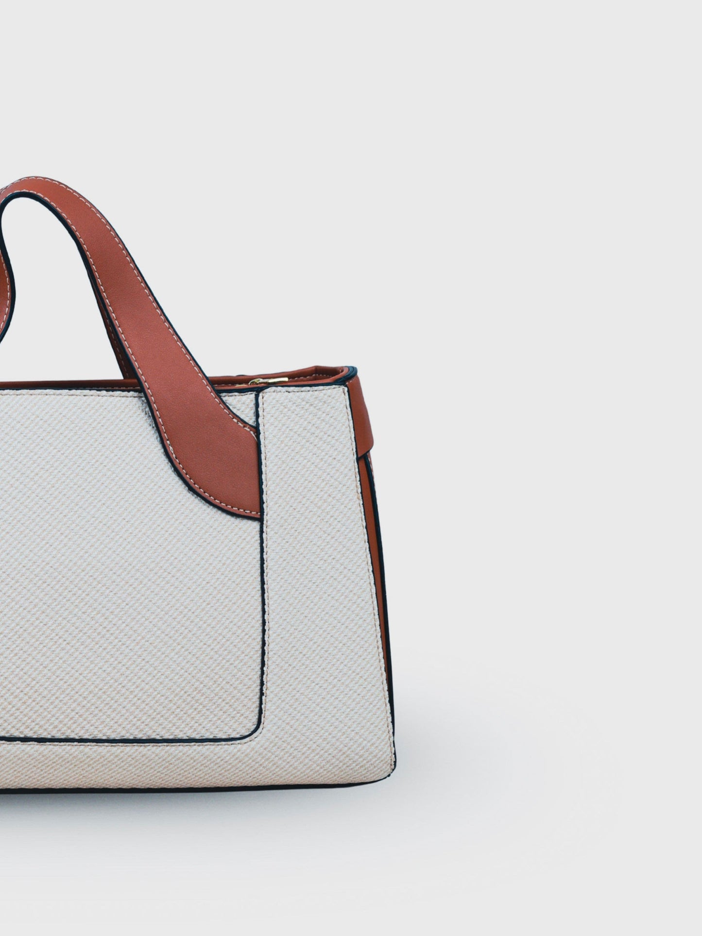 Capri Vanilla Haze vegan leather mini tote bag in soft cream tones with structured design and dual handles for women.