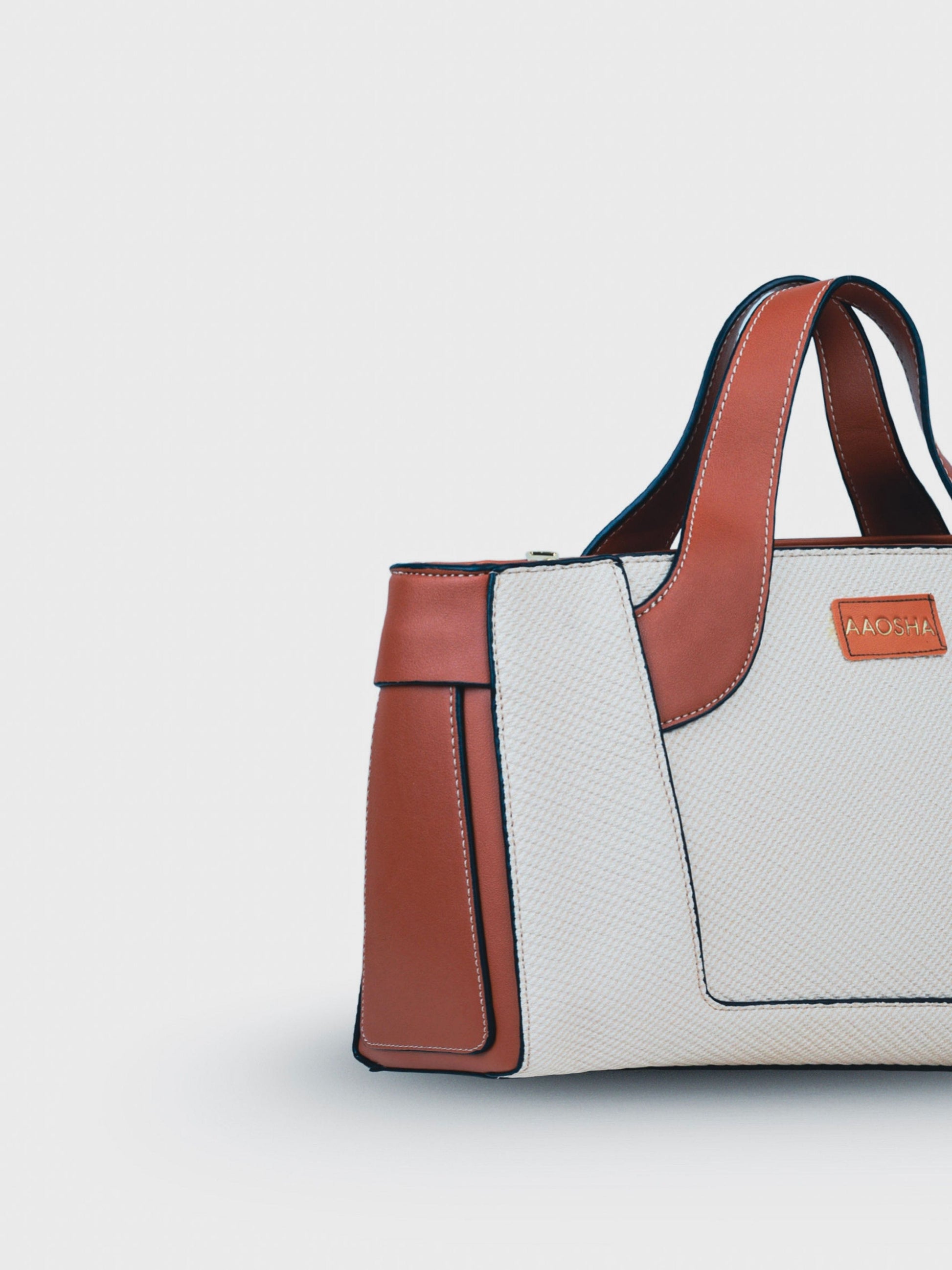 Capri Vanilla Haze vegan leather mini tote bag in soft cream tones with structured design and dual handles for women.