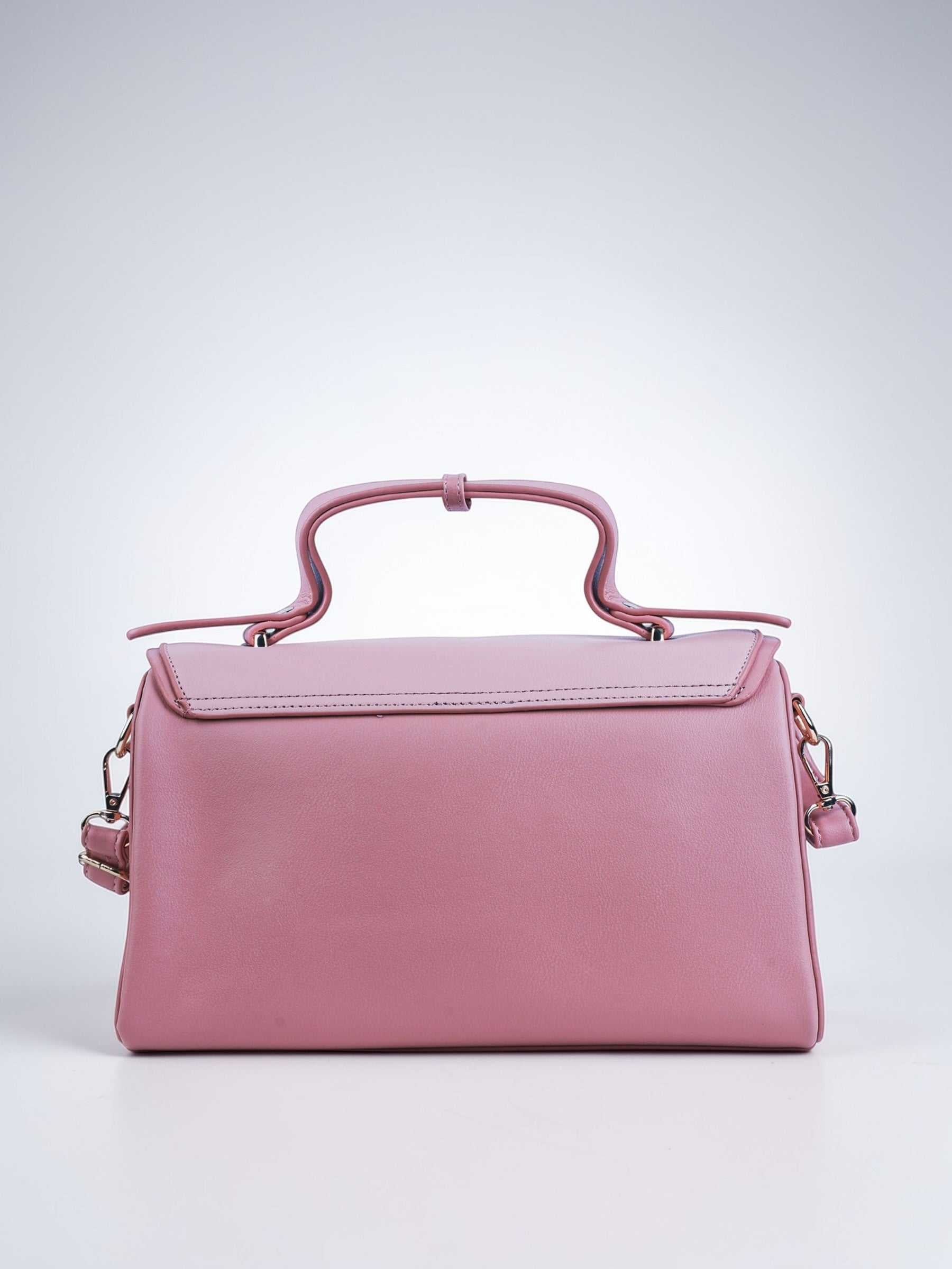 Elara Cotton Candy vegan leather crossbody bag in soft pink with structured design and adjustable strap for women.