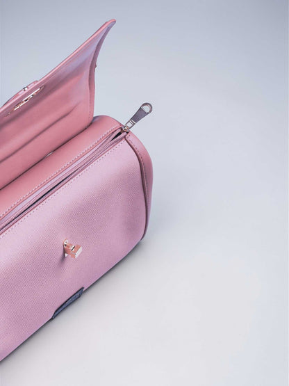 Elara Cotton Candy vegan leather crossbody bag in soft pink with structured design and adjustable strap for women.