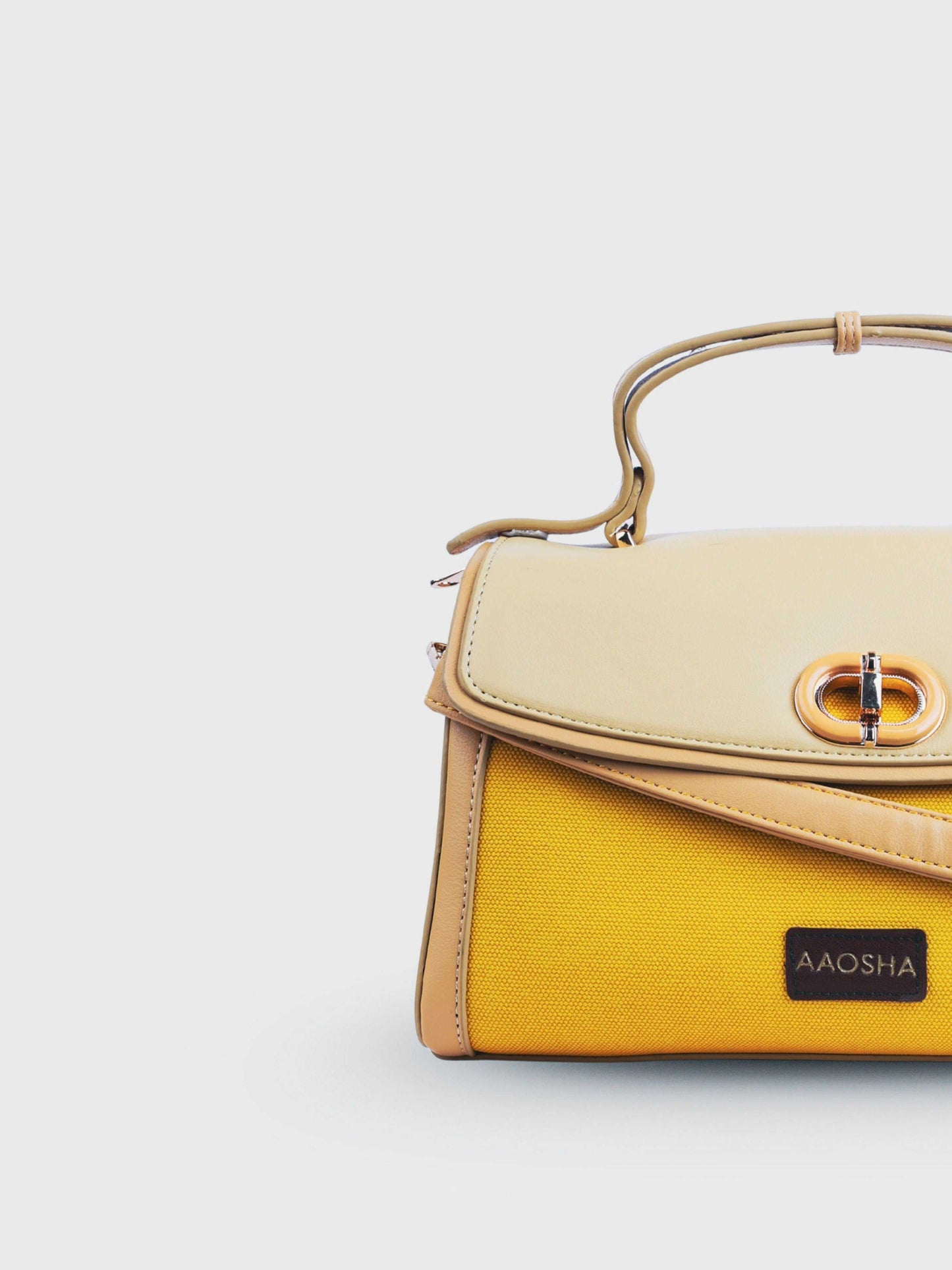 Elara Sunshine vegan leather crossbody bag featuring vibrant yellow color with structured silhouette and adjustable strap for women