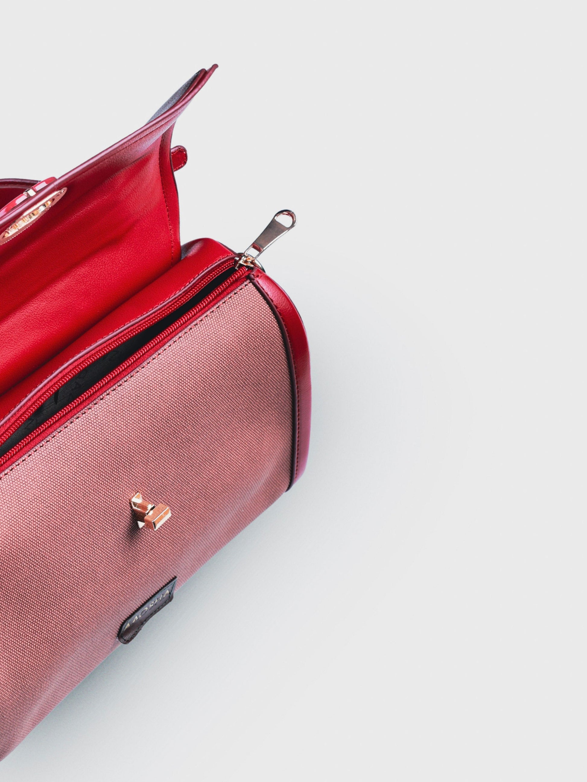 Elara Red Chilli vegan leather crossbody bag in rich red with structured silhouette and adjustable strap for women