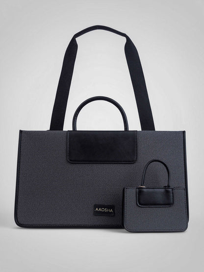 Florence Eternal Ink vegan leather tote bag in black with structured silhouette and dual handles for women.