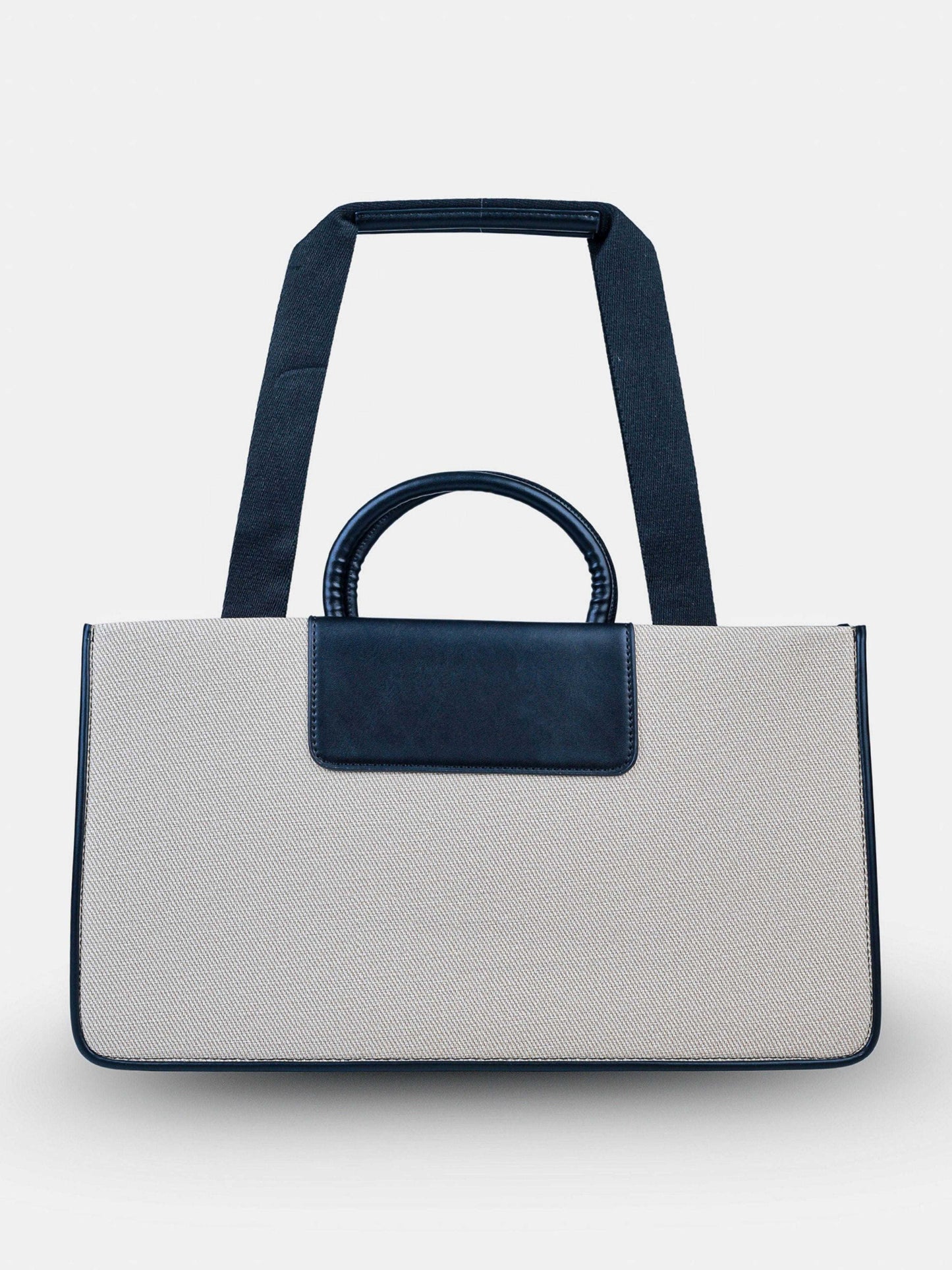 Florence Ivory Noir vegan leather tote bag in off white and black tones with structured design and dual handles for women.