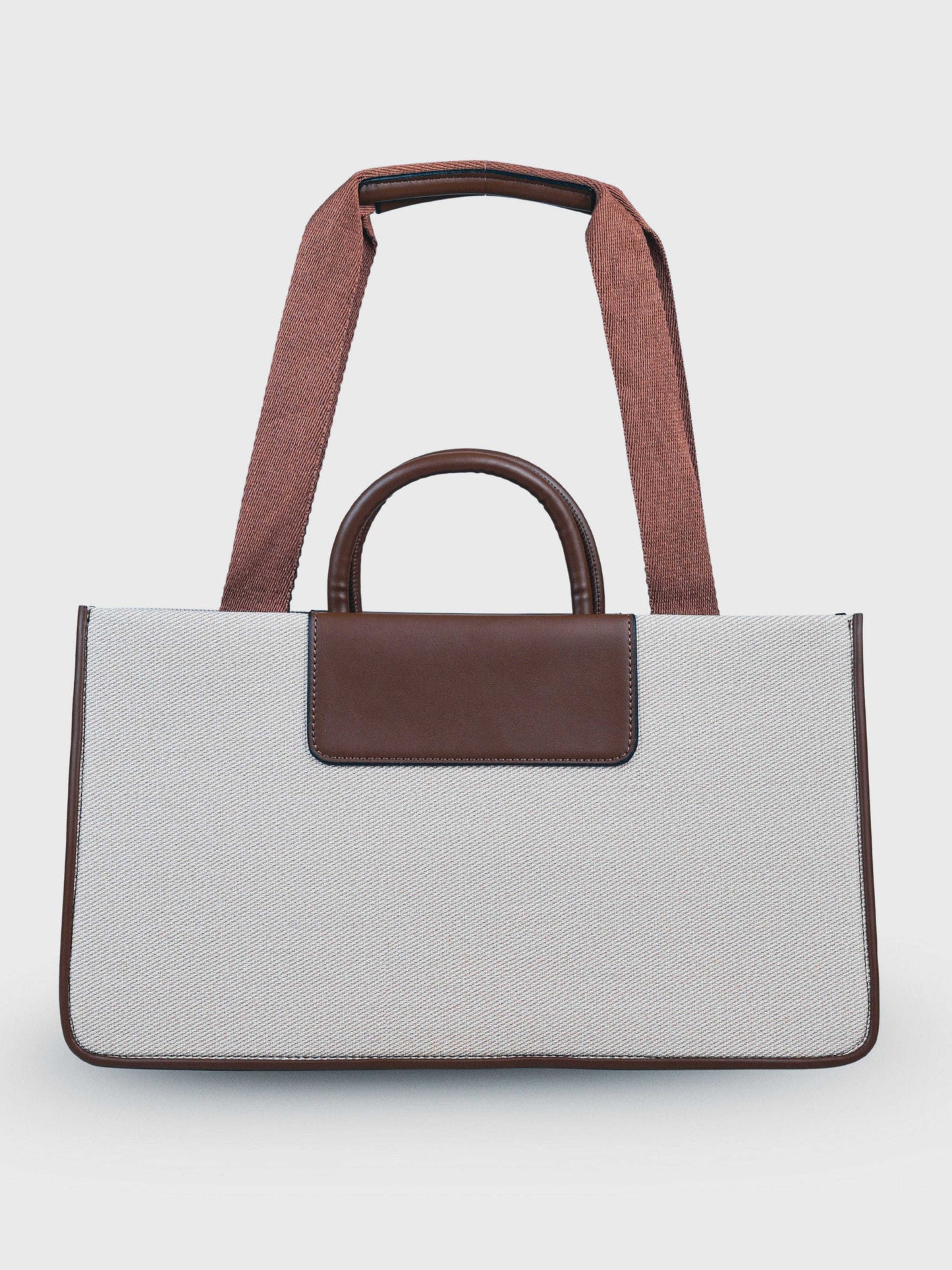 Florence Vanilla Haze vegan leather tote bag in warm cream tones with structured design and dual handles for women.