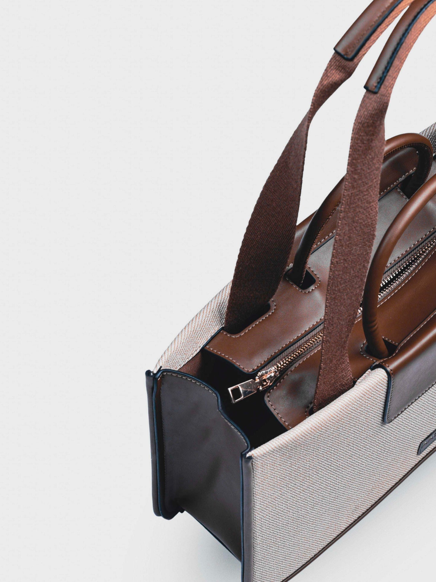 Florence Vanilla Haze vegan leather tote bag in warm cream tones with structured design and dual handles for women.