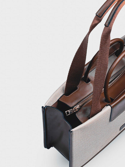 Florence Vanilla Haze vegan leather tote bag in warm cream tones with structured design and dual handles for women.