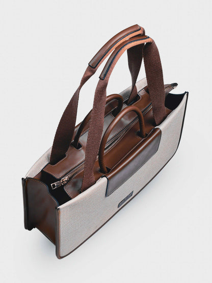 Florence Vanilla Haze vegan leather tote bag in warm cream tones with structured design and dual handles for women.