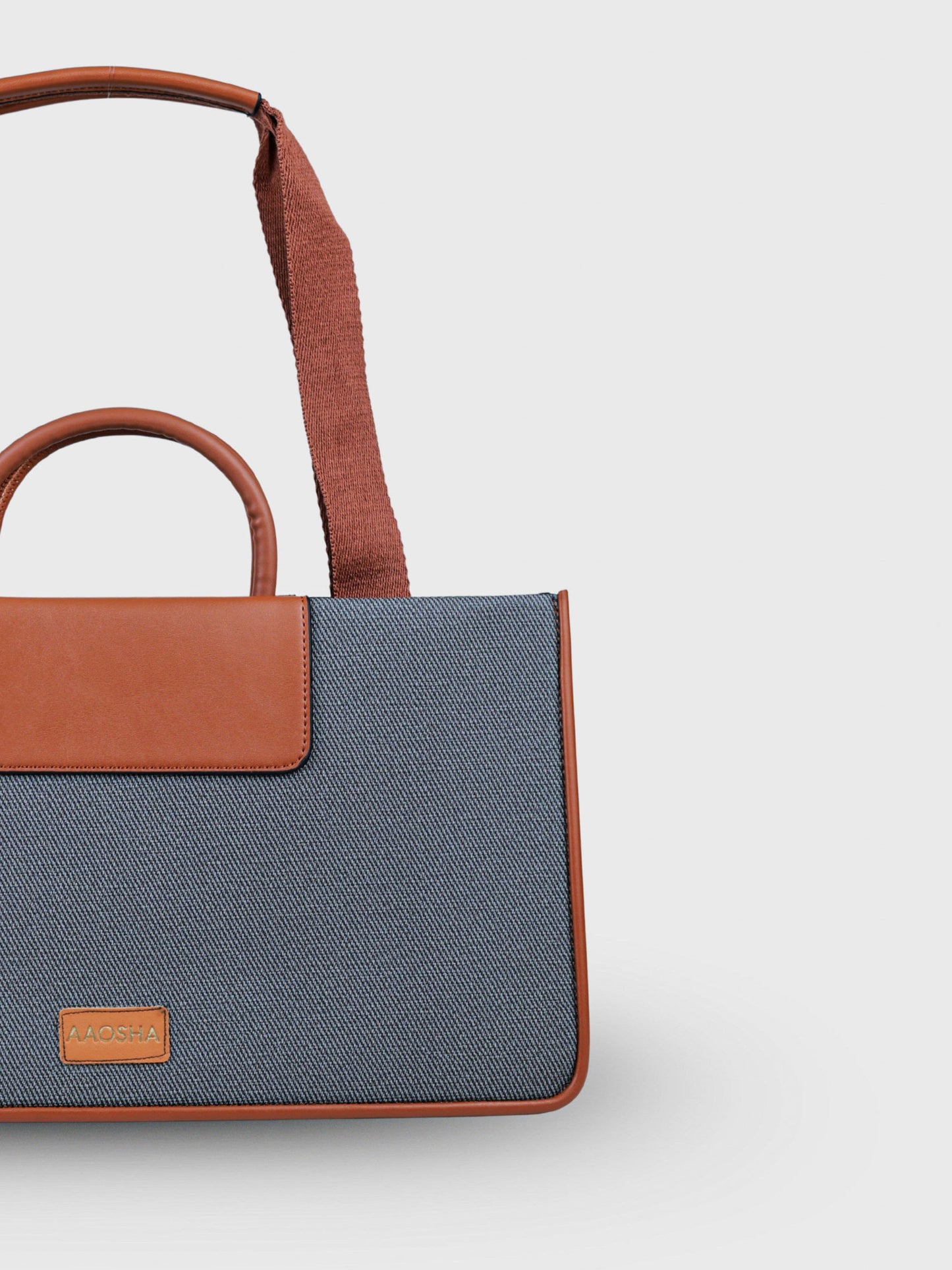 Florence Ash Caramel vegan leather tote bag in warm gray and tan tones with structured design and dual handles for women.