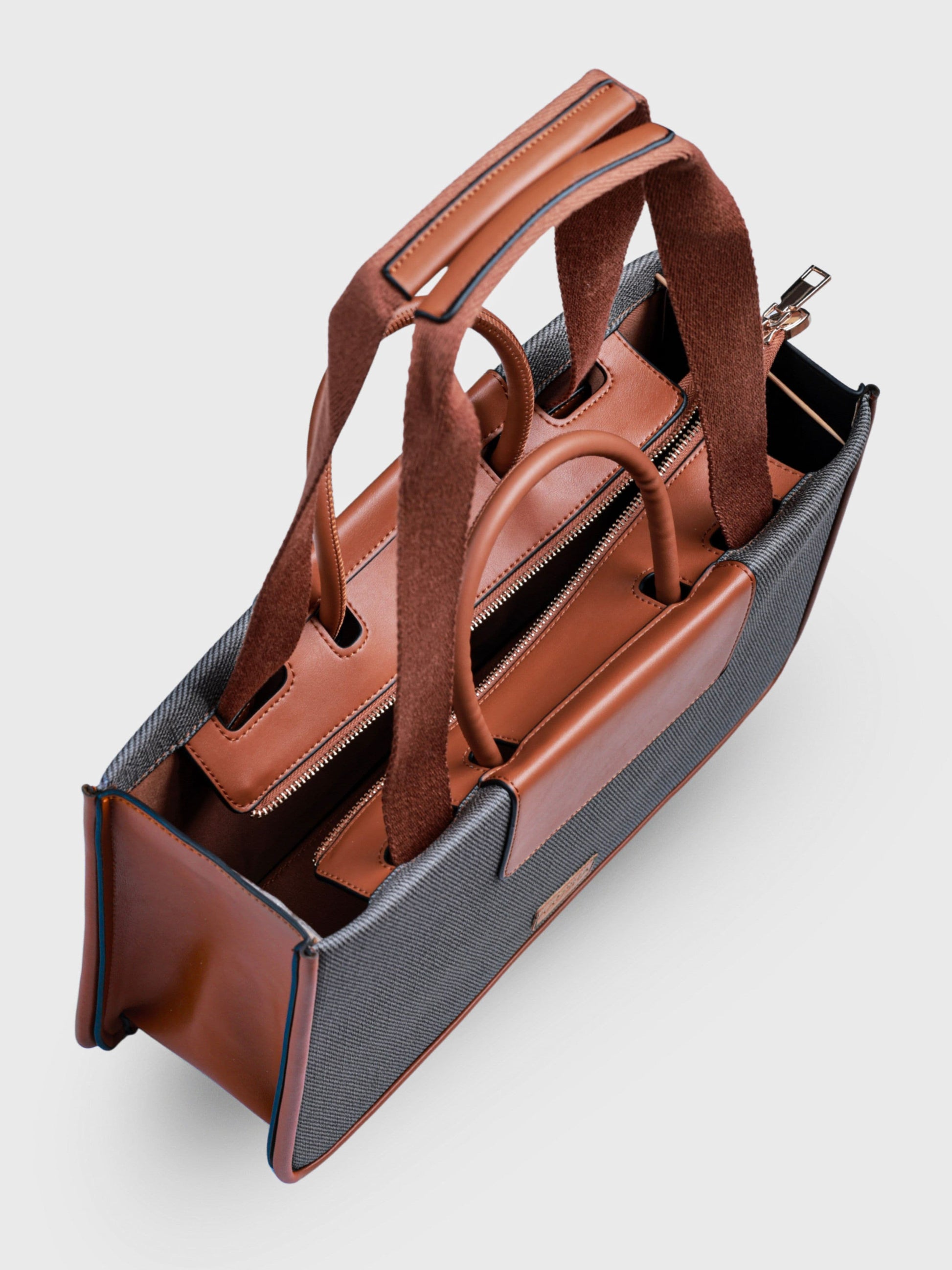 Florence Ash Caramel vegan leather tote bag in warm gray and tan tones with structured design and dual handles for women.