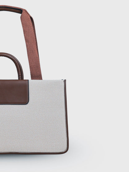 Florence Vanilla Haze vegan leather tote bag in warm cream tones with structured design and dual handles for women.
