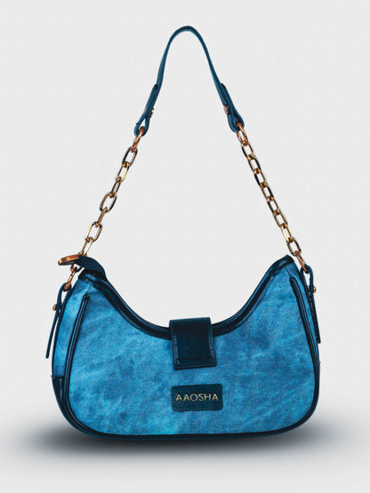 Luna Denim Blue vegan leather shoulder bag in rich blue denim with structured design and chain handle for women.
