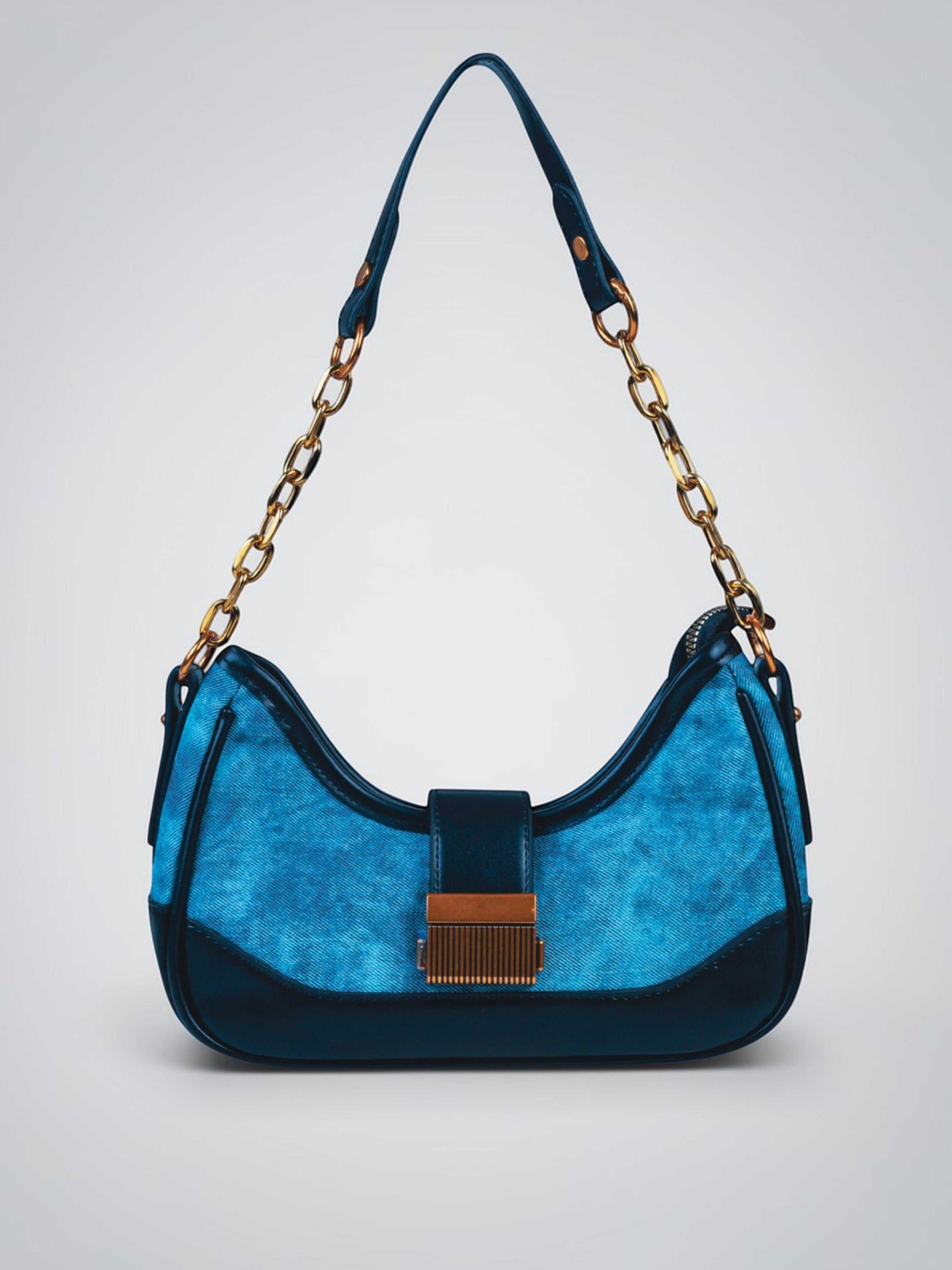Luna Denim Blue vegan leather shoulder bag in rich blue denim with structured design and chain handle for women.