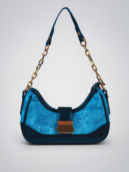 Luna Denim Blue vegan leather shoulder bag in rich blue denim with structured design and chain handle for women.