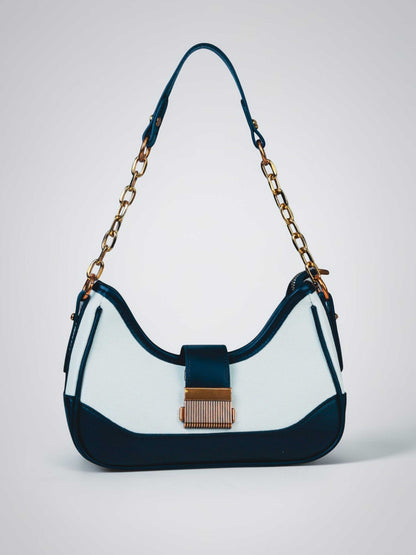 Luna Ivory Noir vegan leather shoulder bag in cream and black tones with structured design and chain handle for women.