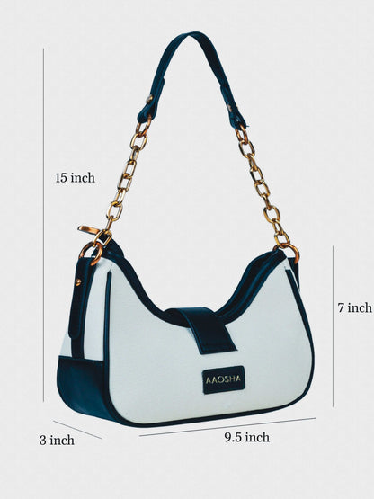 Luna Ivory Noir vegan leather shoulder bag in cream and black tones with structured design and chain handle for women.