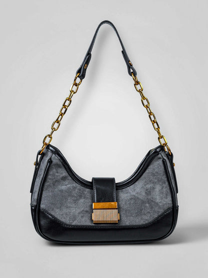 Luna Midnight vegan leather shoulder bag in black denim with structured silhouette and chain handles for women.