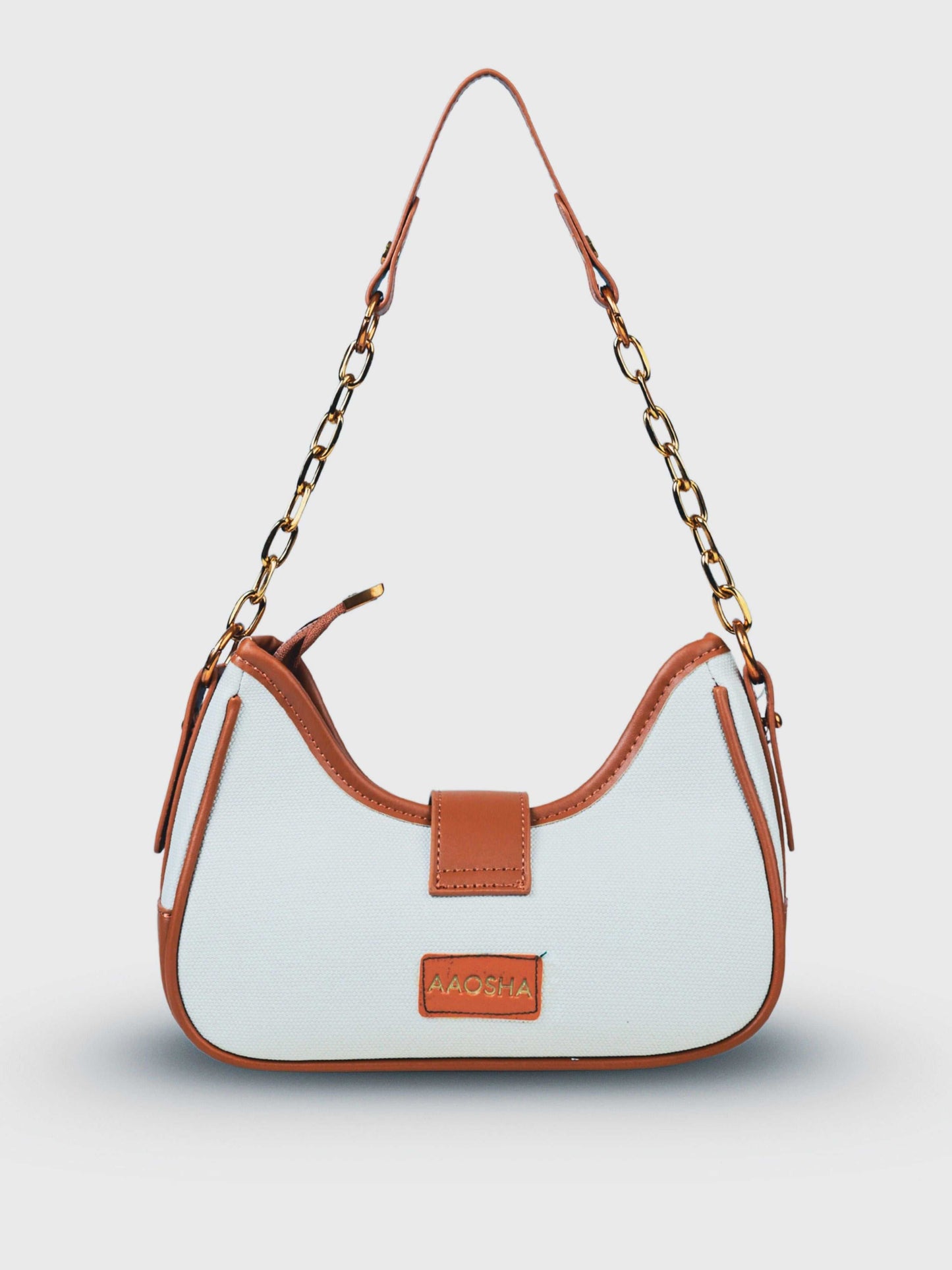 Luna Vanilla Haze vegan leather shoulder bag in soft cream tones with structured design and chain handle for women.
