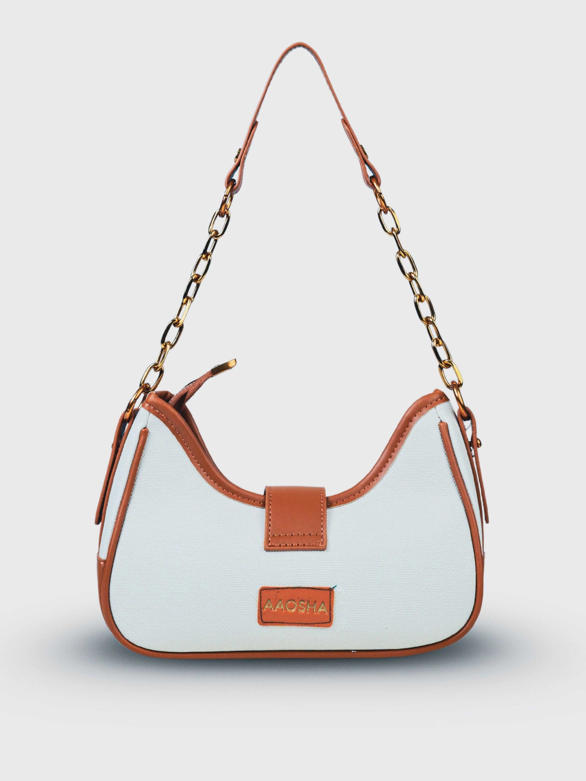 Luna Vanilla Haze vegan leather shoulder bag in soft cream tones with structured design and chain handle for women.