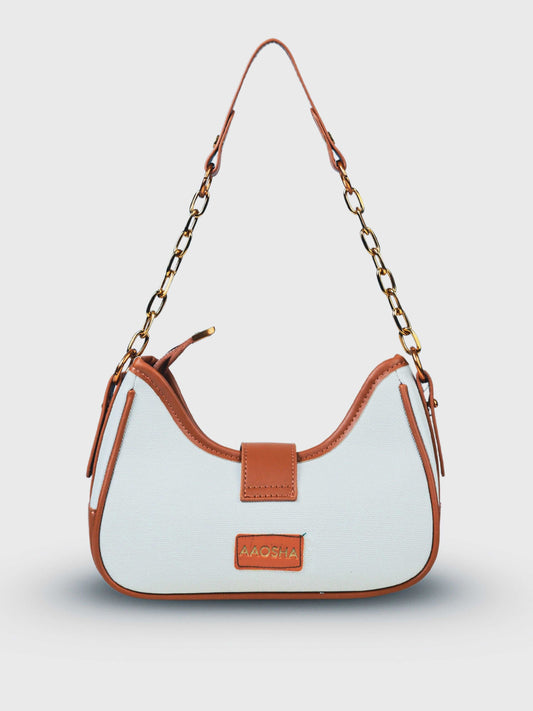 Luna Vanilla Haze vegan leather shoulder bag in soft cream tones with structured design and chain handle for women.