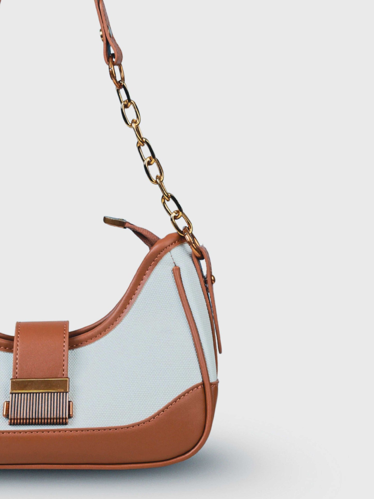 Luna Vanilla Haze vegan leather shoulder bag in soft cream tones with structured design and chain handle for women.