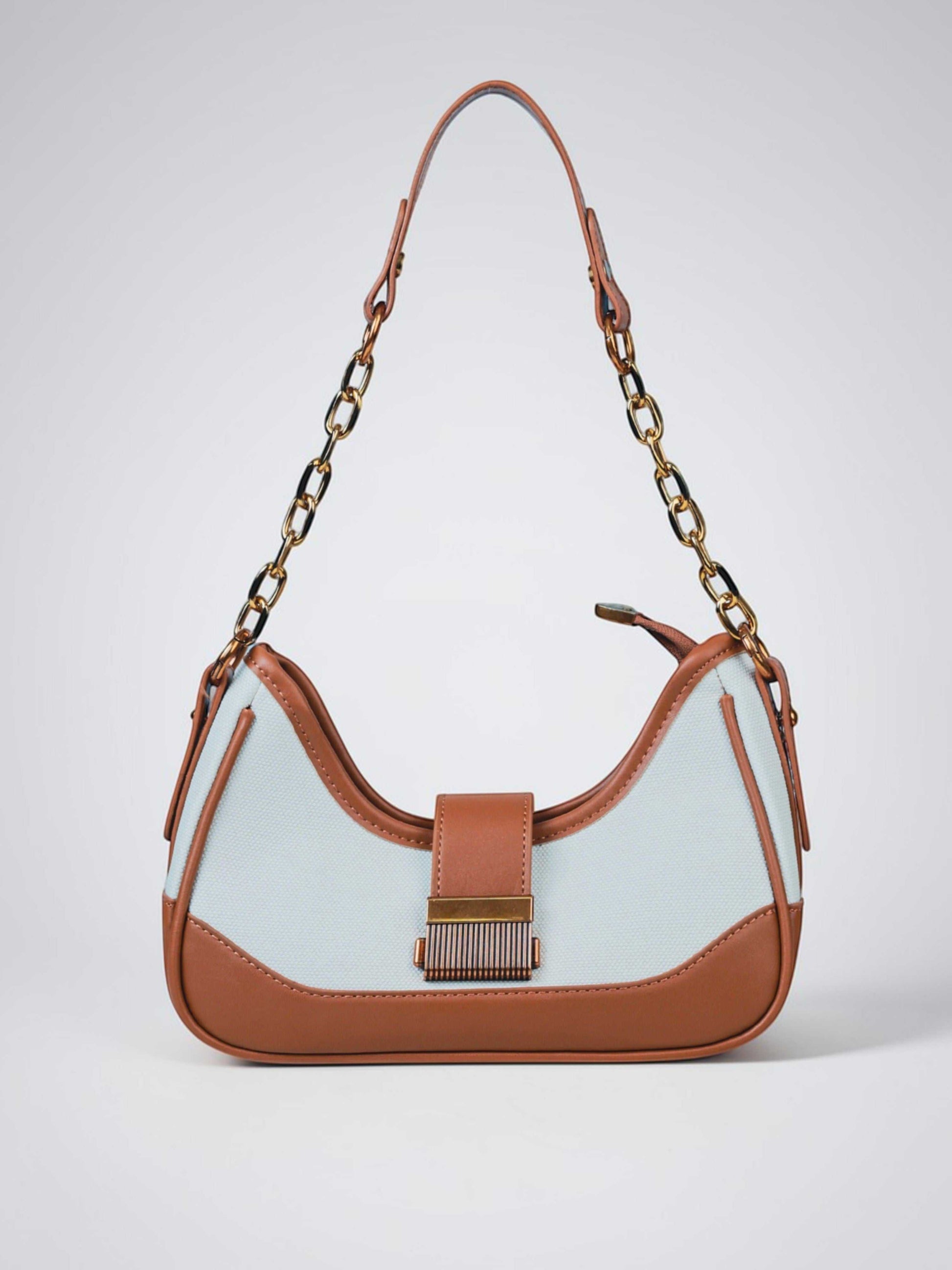 Luna Vanilla Haze vegan leather shoulder bag in soft cream tones with structured design and chain handle for women.
