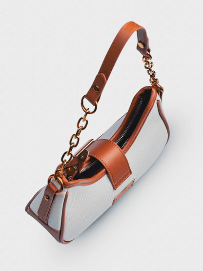 Luna Vanilla Haze vegan leather shoulder bag in soft cream tones with structured design and chain handle for women.
