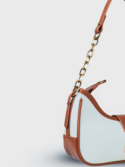 Luna Vanilla Haze vegan leather shoulder bag in soft cream tones with structured design and chain handle for women.