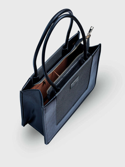 Valencia Eternal Ink vegan leather shoulder bag in pure black with structured silhouette and dual handles for women.