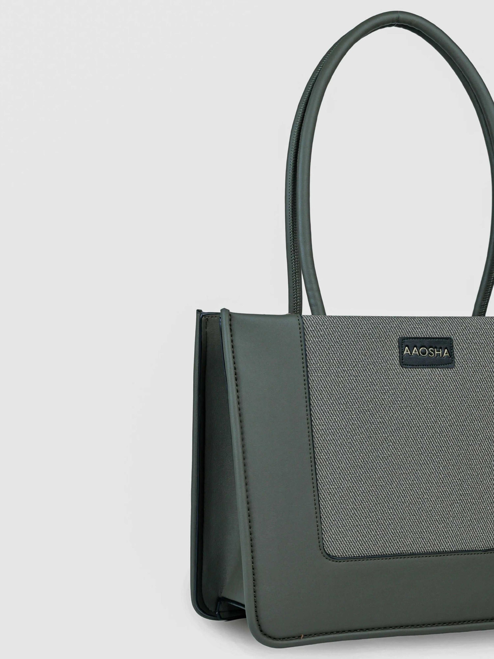 Valencia Sage Mist vegan leather shoulder bag in soft sage green with structured design and dual handles for women.