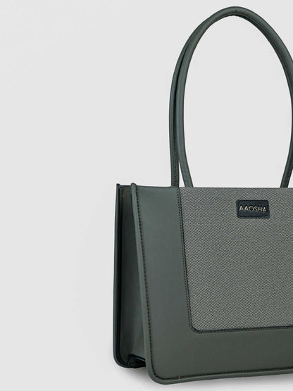 Valencia Sage Mist vegan leather shoulder bag in soft sage green with structured design and dual handles for women.